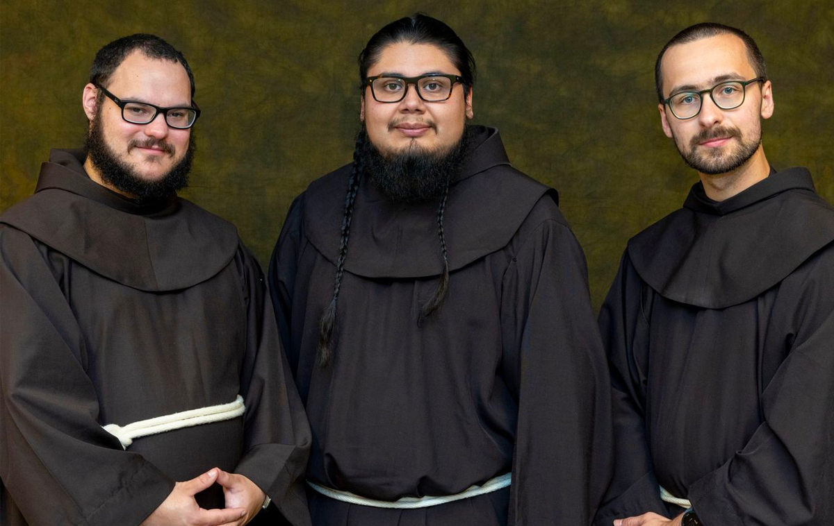 Jason Peterson, Dan Rey and Richard Gaunt, three young men in their Franciscan habits