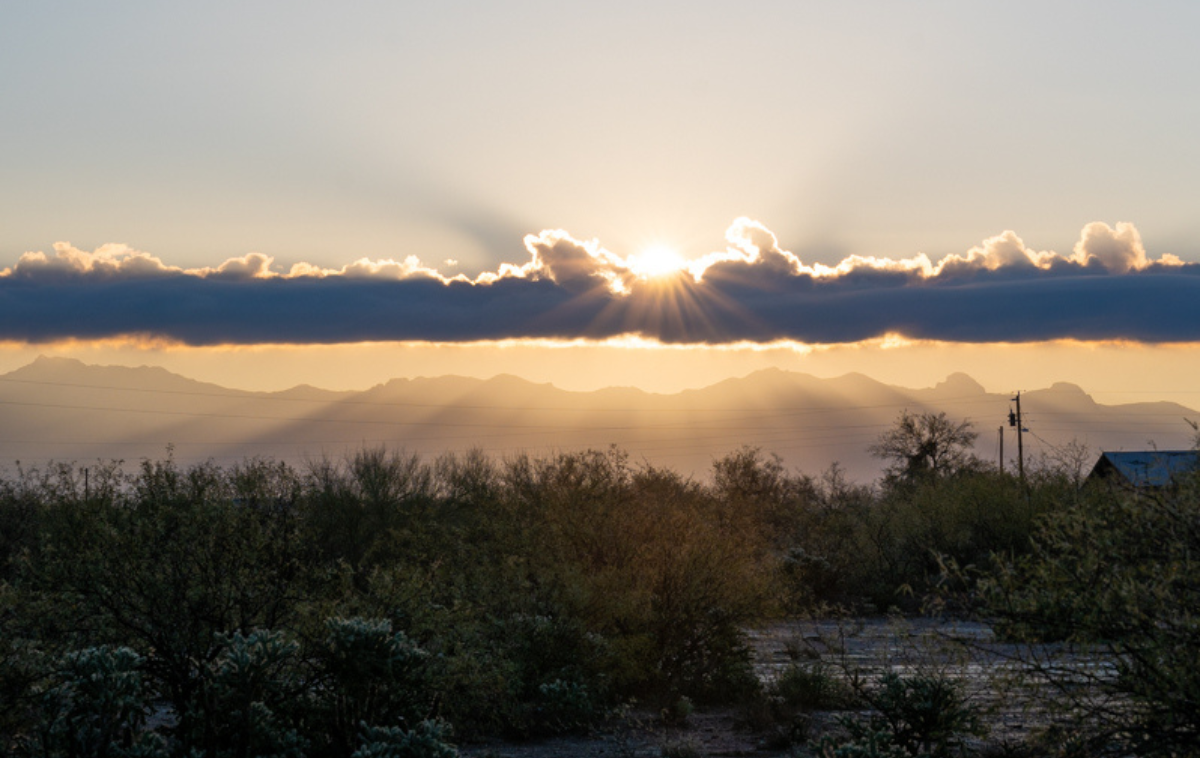 The sun rises over the beautiful Arizona desert mountains