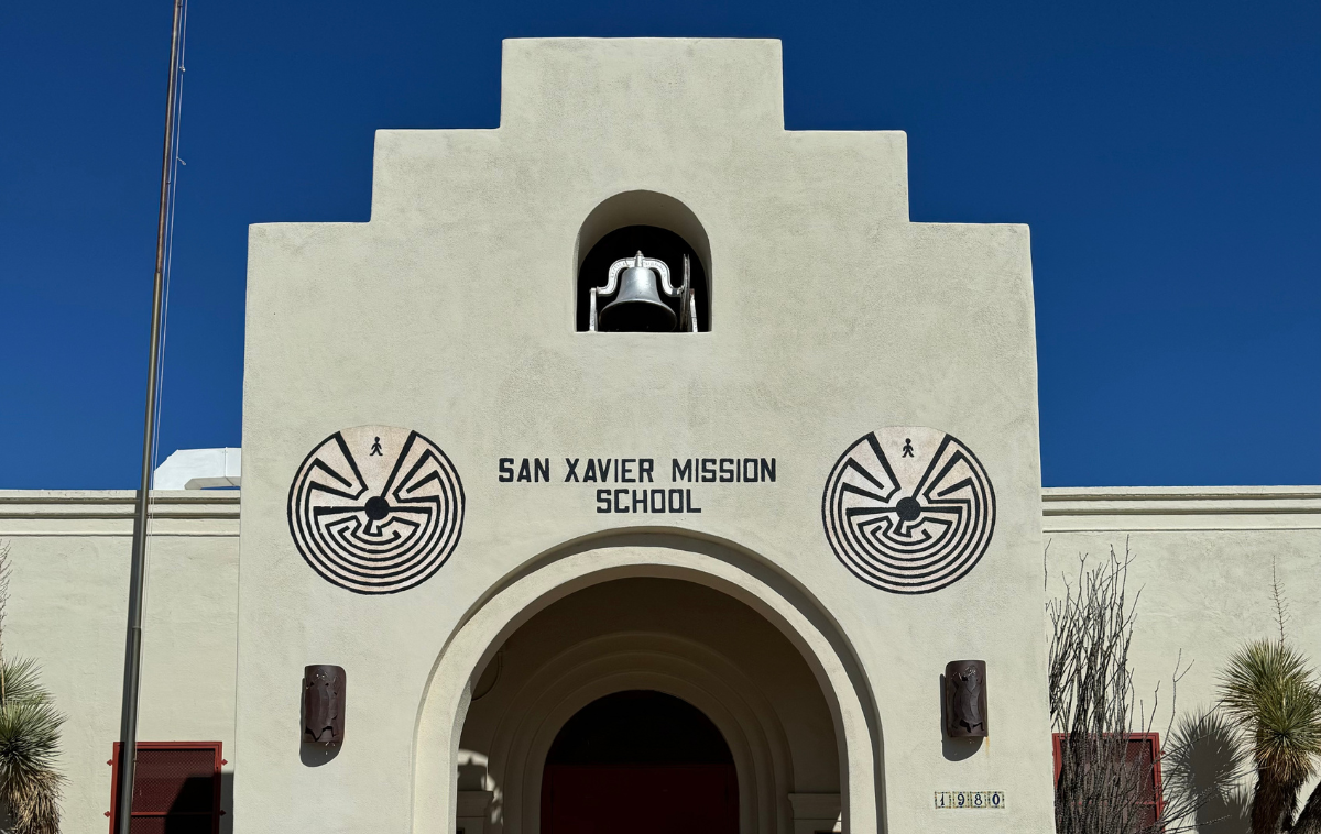 A historic Mexican baroque building with the words 