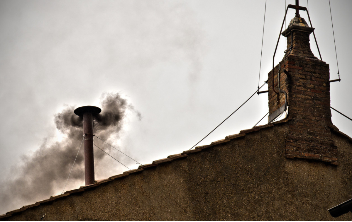 In 2013, black smoke from a chimney at the Sistine Chapel signaled no decision on a new pope. White smoke means a successful election. (Photo courtesy of Catholic News Service