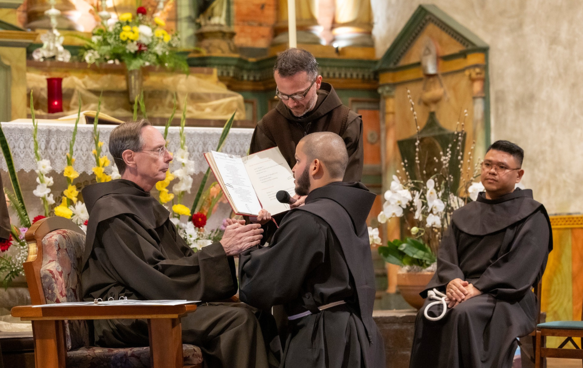 Caption: Provincial Minister Br. Larry Hayes, OFM, receives the vows of Br. Seraphim (Christian) Rito Gonzalez, OFM. (Photo by Br. Octavio Duran, OFM)