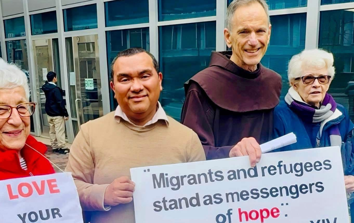 Br. John Heffernan, OFM, joins parishioners to pray outside of a courthouse in Hyattsville, Md., where immigrant cases are heard.&nbsp; (Photo courtesy of St. Camillus Parish)