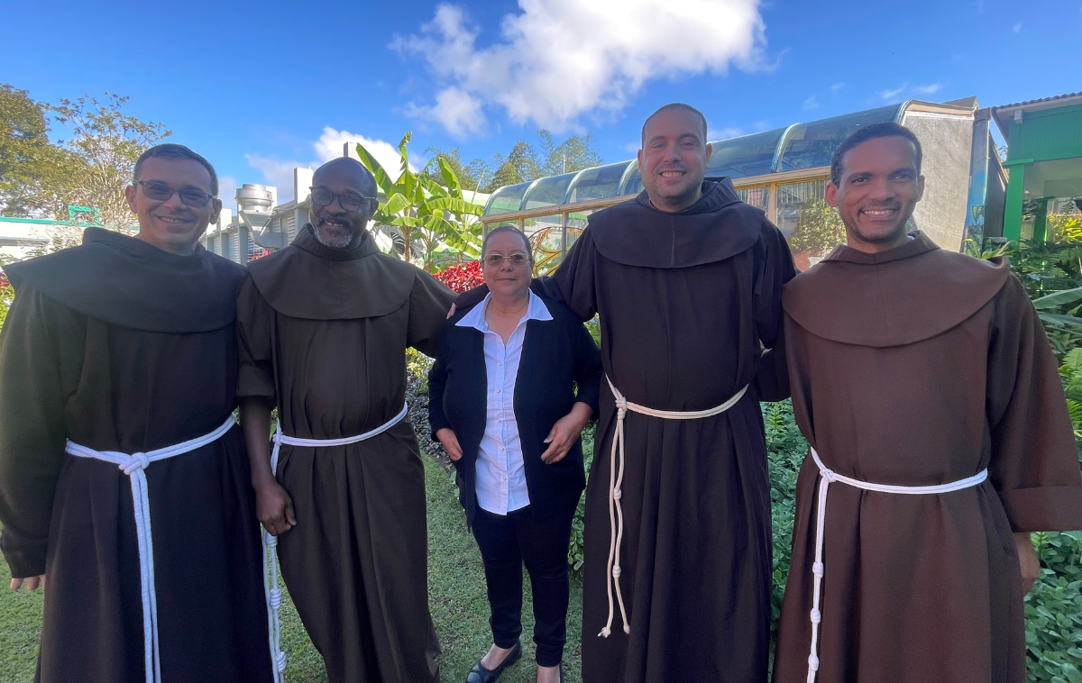 Br. Ciduoane Joseph, OFM (second from left), and Br. James La Grutta, OFM (fourth from left), visited Casa Pueblo, a secular foundation focused on environmental protection, community growth and solar energy. Br. James stressed the need to prioritize Spanish for their Order and the global future, while promoting fraternity. (Photo courtesy of Br. James)