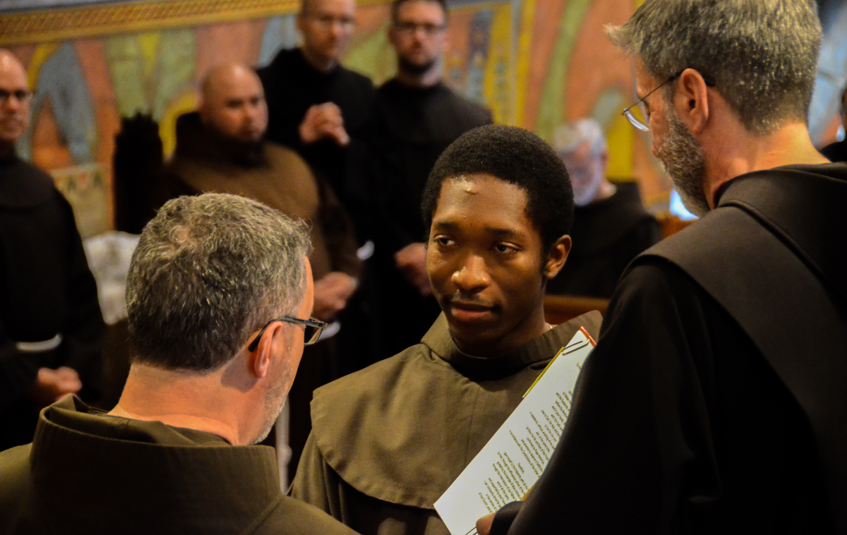 Br. Raphael Ozoude, OFM, taking his first vows at the Interprovincial Novitiate in Santa Barbara, California, in 2019. First vows signify a meaningful step in a friar&rsquo;s formation, helping both the man and the community discern how God may be guiding him towards a fuller commitment to living out the Gospel. (Photo by Br. Octavio Duran, OFM)