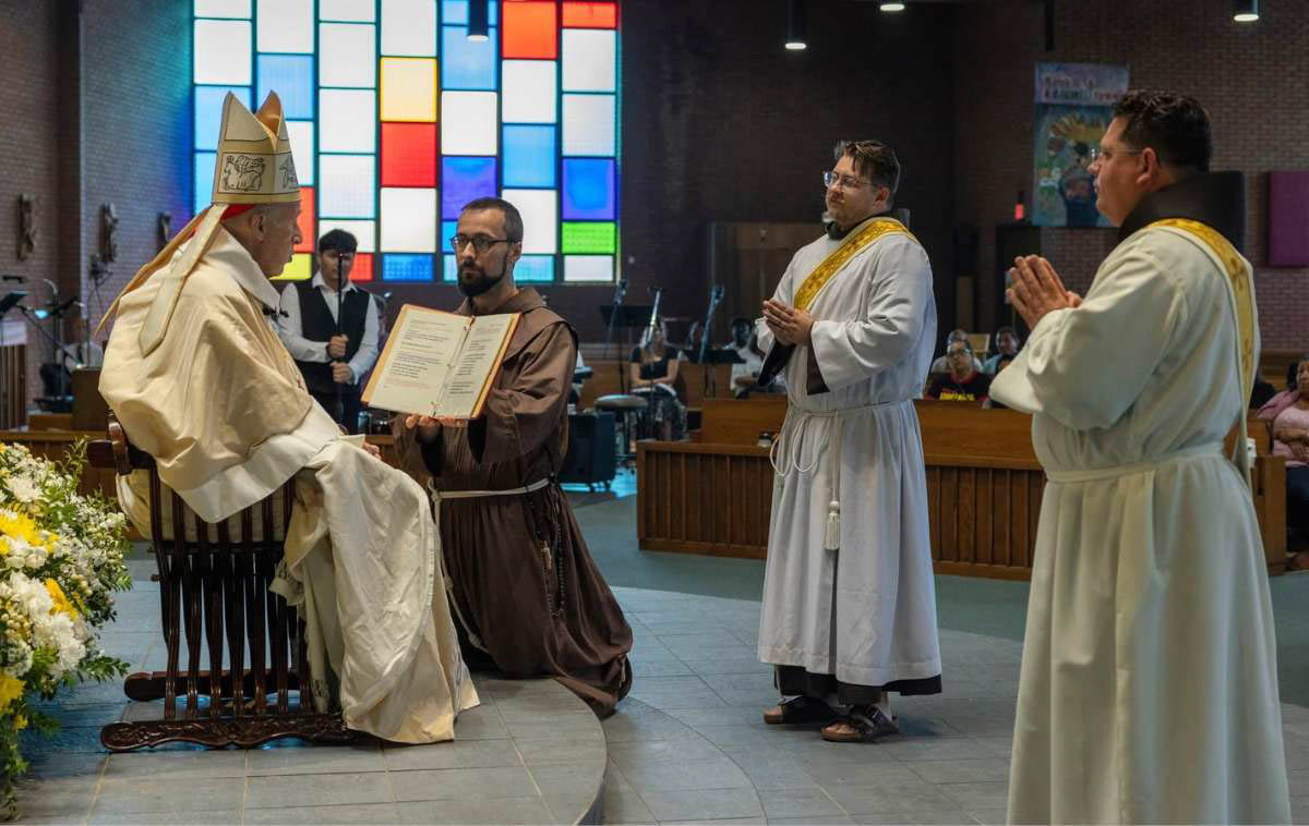 Cardinal McElroy called the candidates forward from the assembly of the faithful. Each responded with a resounding "Presente!" or "Present!", affirming their willingness to accept God&rsquo;s call to priesthood. (Photo by Br. Octavio Duran, OFM)