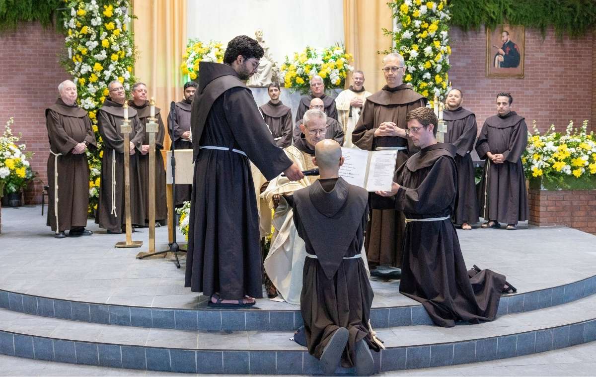 Minister Provincial Br. Michael Perry, OFM, receives the vows of Br. Nathaniel Tran, OFM. (Photo courtesy of Br. Octavio Duran, OFM)