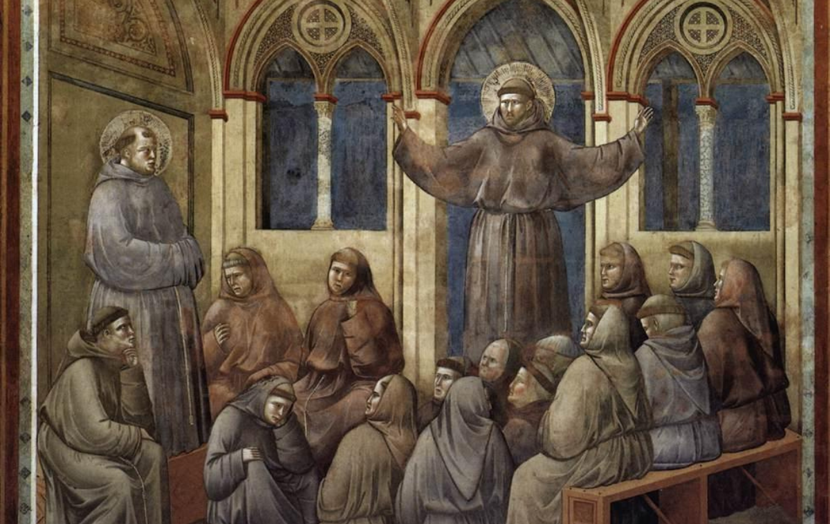St. Francis Appearing at the Chapter of Arles by Giotto di Bondone depicts a miraculous event where St. Francis appears with outspread arms to bless a gathering of friars while St. Anthony of Padua is preaching. (Public Domain) 