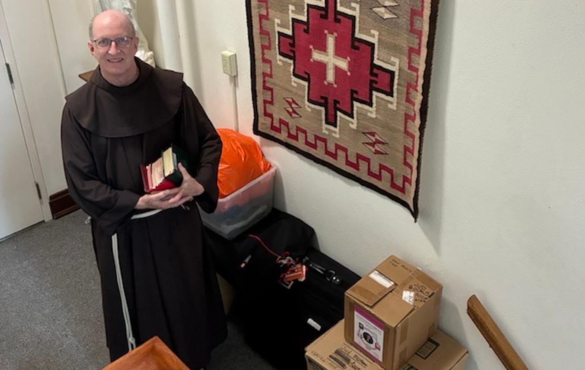 Br. Jud Weiksnar, OFM, is packed and ready to roll out of Cincinnati’s St. Clement Friary and on to Mt. Irenaeus in West Clarksville, New York. “The only thing I’m grateful to leave behind is Cincinnati pizza,” he said. “Buffalo was rated No. 4 in the country for pizza. Cincinnati, I believe, came in No. 53.” (Photo by Br. Frank Jasper, OFM) 