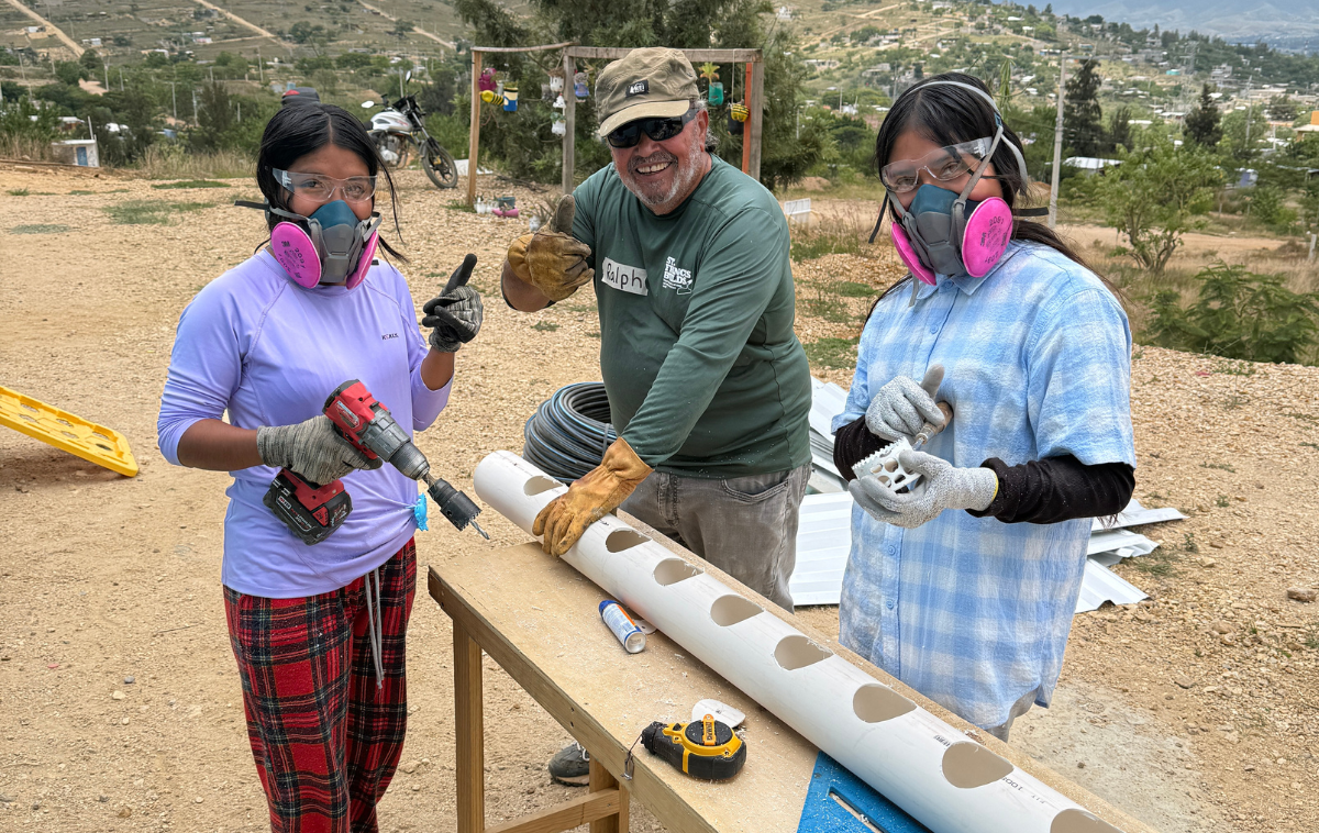 St. Camillus parishioner Rafael Quinones volunteers with St. Francis Builds in Oaxaca, Mexico to build a hydroponics farm at a school and teach students how to plant and care for the crops. (photo courtesy of Levo International)