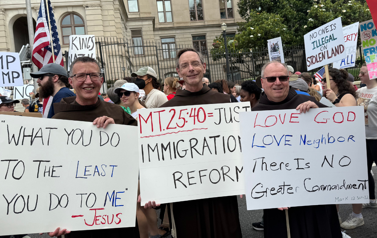 Brothers Mark Soehner, OFM, Larry Hayes, OFM, and Larry Ford, OFM, took part in 
the No Kings protest. (Photo courtesy of Br. Larry Ford, OFM)&nbsp;